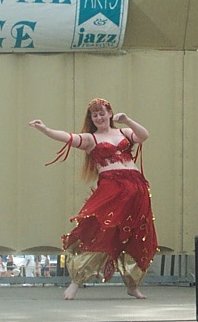 dancer in red and gold