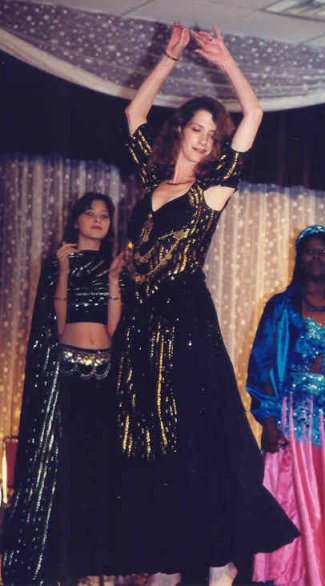 Mahirimah performs on stage