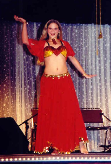 Safira performs in red