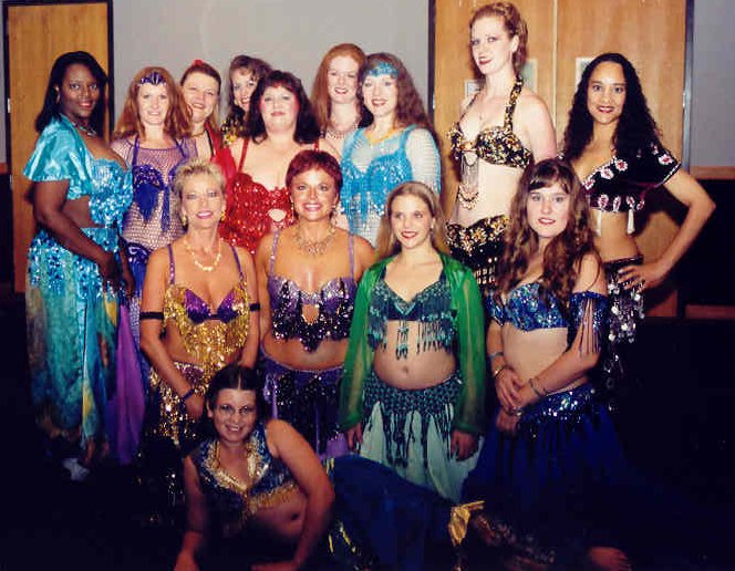 group of dancers pose for photo