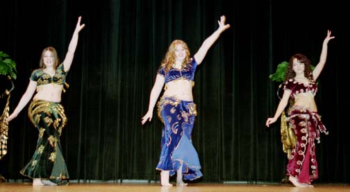 trio of dancers on stage