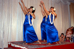  dancers in blue perform on stage