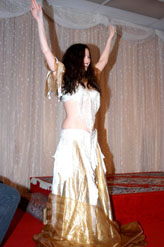 dancer in gold and white