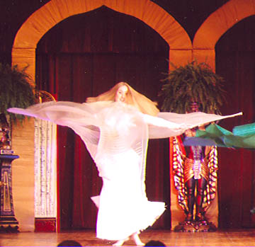 Dancer Sarafina spins with white wings