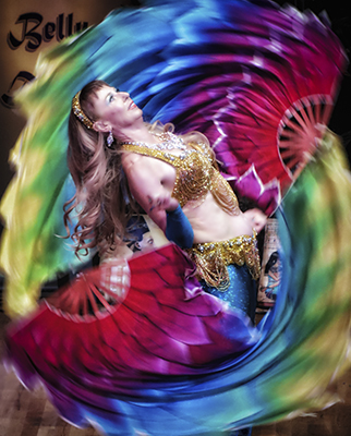 light haired dancer wearing a gold bedlah and blue costume spins with a pair of poi - fan veils made of red, purple, blue, green and yellow fabric wrapping around her